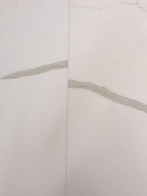 The seam and mismatched pattern on our island