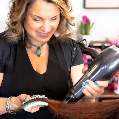 Hard at work, doing my favorite thing. Styling and making hair beautiful. Call or text me for your next appointment. 513-668-3740