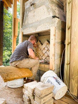 Laying the firebrick in an Isokern fireplace!