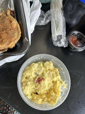 Potato salad and fried pork chop
