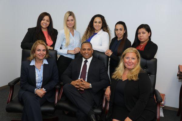 Pre-covid 2019 photo of the Rosenberg & Rodriguez team.