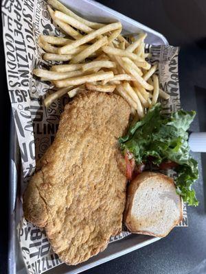 Pork tenderloin sandwich and fries
