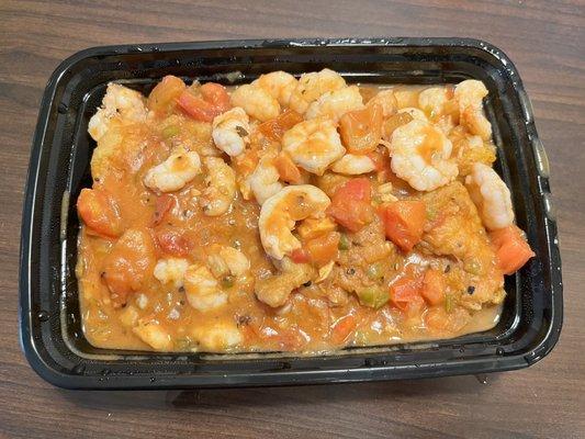 Catfish Lorell (Catfish over rice with shrimp on top.)