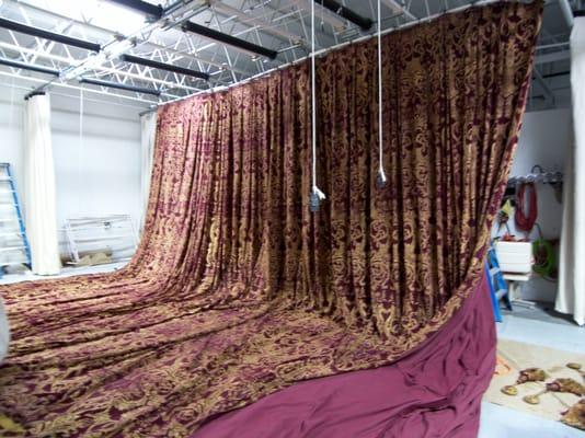 Cleaning and Flame Treating drapery at the shop