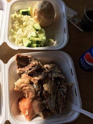 Here's the delicious roasted pork and lamb combo with cabbage and rolls.