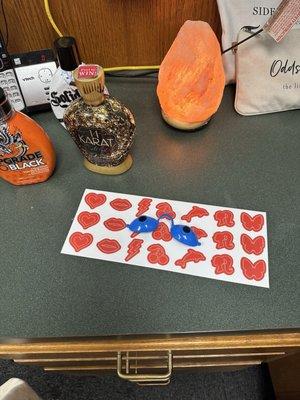 Tanning lotion and stickers (waivers for minors available)