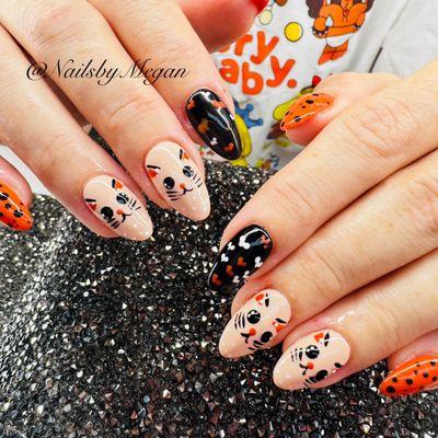 Megan did it again she made my nails beautiful she was able to save my nail that I broke