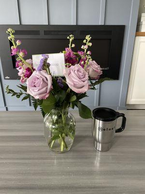 Comparing my coffee cup with the size of the arrangement.