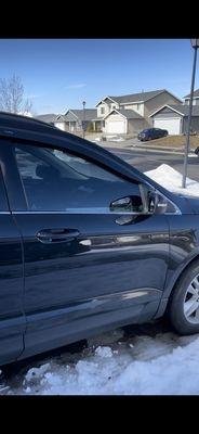 tint delaminating on the passenger window only a few months after being put on.