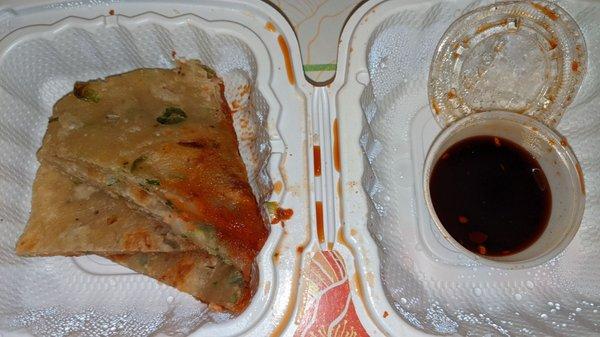 Tasty Scallion Pancake with dipping sauce.