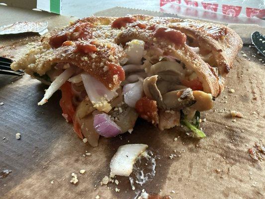 Build Your Own Calzone overflowing with toppings