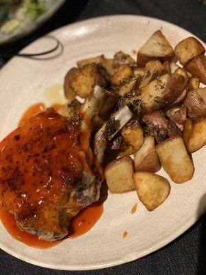 Delicious Double boned tender Pork Chops with blueberry, strawberry and orange marmalade plus potatoes.