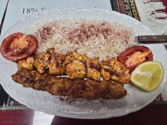 Chicken Sultani - chicken koobideh and chicken kabob. Simple, delicious, but very flavorful dish with basmati rice & grilled tomatoes.