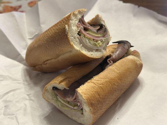 Em's Ultimate Club with Ham, Turkey and Roast Beef 11″ Grinder: $10.89