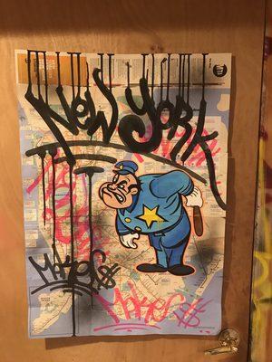 Graffiti painted train map by Make$