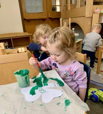 Exploring the color green and developing fine motor skills