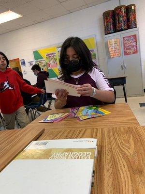 A girl learning about songs