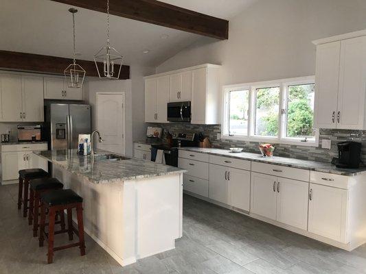 My kitchen went from drab to fab! Love my new cabinets from Raby Home Solutions!