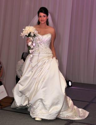 Model wearing a Symphony Bridal gown, retails $3800 Only $1,275 or best offer!