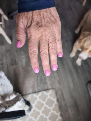 Dark pink dip powder with two coats of a lighter gel color to cover the nail tech's epic fail!