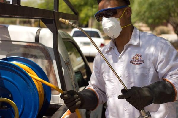 One of our pest control technicians getting ready to treat a home in Phoenix.