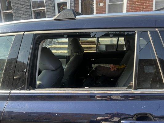Smashed window in Philly by vandals.