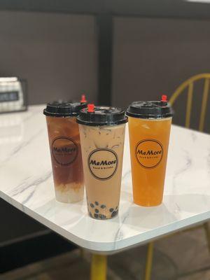 (L to R) Passion fruit lemon tea with lychee jelly, Hong Kong milk tea with boba, passion fruit green tea
