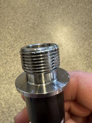 Oil filter cross threaded.