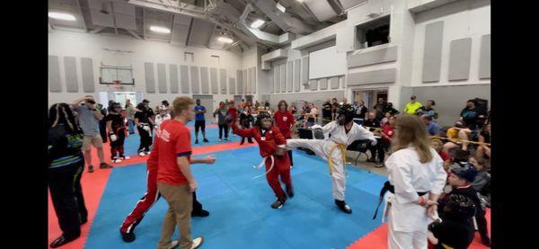 My son sparring in a tournament.