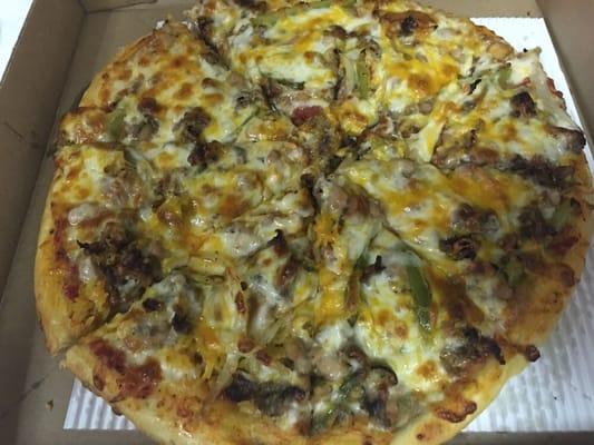 Mambo Loco Pizza Chicken or Beef Fajitas with rice and beans pizza. Like eating a burrito but in a pizza.