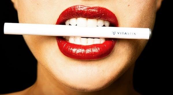 Model Kristen Vahl with her favorite Calm Formula - White Edition found only at www.VitaStik.com