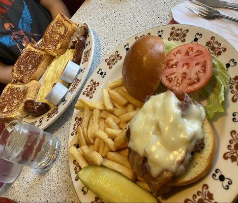 Bacon cheeseburger meal and my sister has the French toast with an omelette and some sausage.