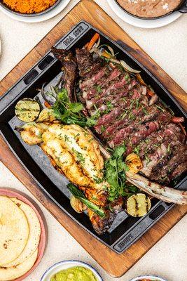 Surf & Turf Tablita featuring tomahawk and lobster tail...perfect for sharing!
