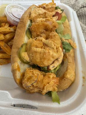 A metal piece cooked into shrimp batter of my Po Boy Sandwich.