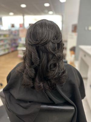 Layered haircut blow drying style