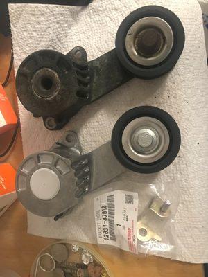 old and new belt tensioner and new bracket