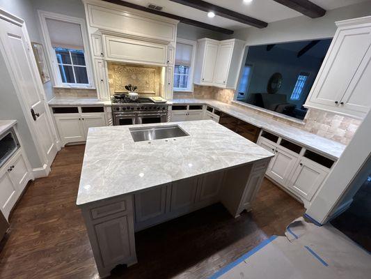 Quartzite kitchen with island.