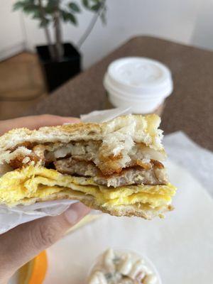 Sausage Eggs and hash brown on Roll