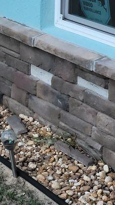 Rocks falling off house 4th time.