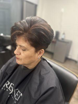 Root color highlights and haircut