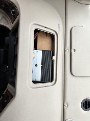 JL audio 5 channel amplifier in a coach