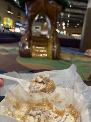 Powder sugar, white chocolate and salt caramel drizzle, and marshmallows DELICIOUS!