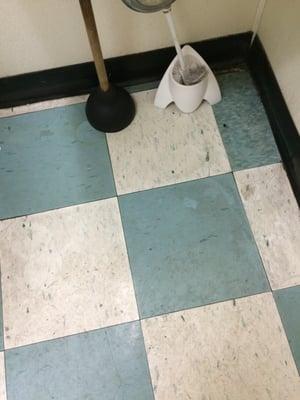 dirty bathroom floor