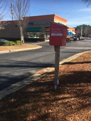 This free little library is in between Tebo and Kiddie academy in Dacula, Ga located in the Dacula Family festival shopping center