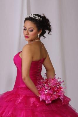 We carry our own exclusive desigs. And we also custom make your choice of dress