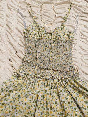 Added pearl beading on the tie strings