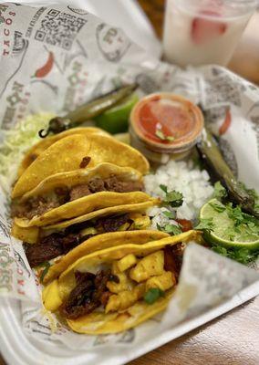 Asada and Al Pastor crispy tacos. That's a lot of tacos. Salsa is spicy and delicious.