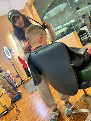 My Son, getting a haircut at Bella & Beaux