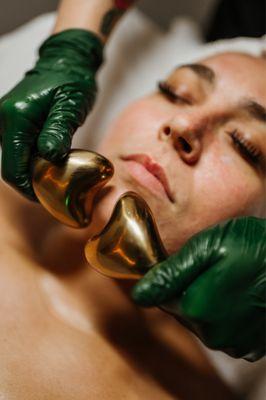 Cold globes during facial treatment