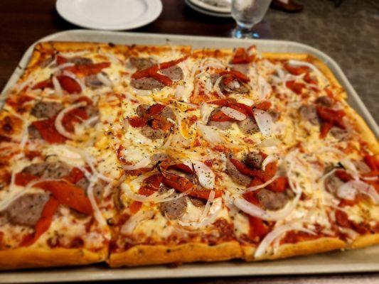 This is their large pizza! It's huge and it's awesome!  Roasted red pepper, sweet Italian sausage & sweet onions, plenty of cheese.